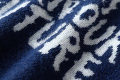 Jungwon Indigo “Don’t Burn Our Future” Knit Sweater
