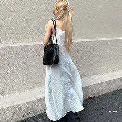 Karina Long Flowy Sling Top